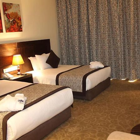 Tolip El Forsan Hotel Исмаилия Екстериор снимка A room at the hotel